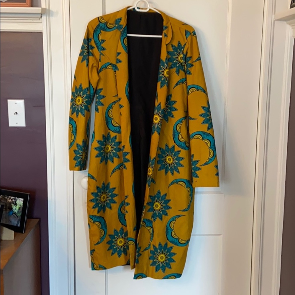Kitenge African print trench coat made in Rwanda